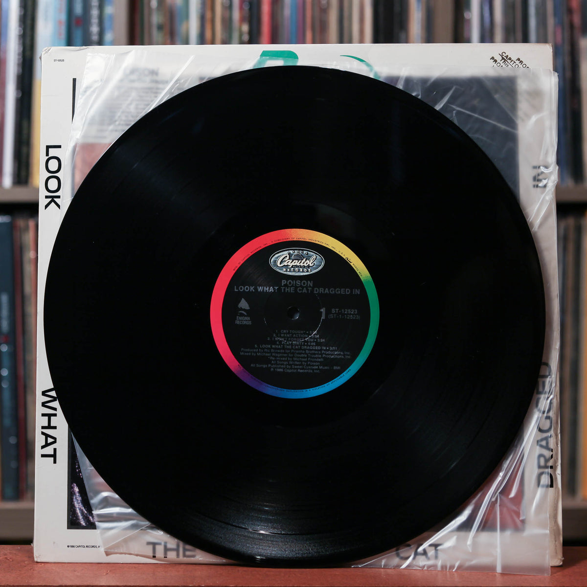 Poison - Look What The Cat Dragged In - PROMO - 1986 Enigma Records, E