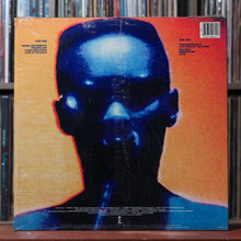 Load image into Gallery viewer, Grace Jones - Warm Leatherette - SHRINK 1986 Island, VG+/VG 2
