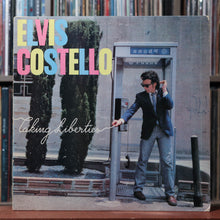 Load image into Gallery viewer, Elvis Costello - Taking Liberties - 1980 Columbia, VG/VG 1
