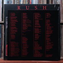 Load image into Gallery viewer, Rush - Moving Pictures - Red Vinyl w/ SHRINK &amp; INSERT - 2015 Mercury, NM/EX 4
