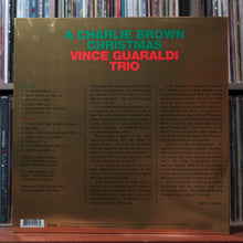 Load image into Gallery viewer, Vince Guaraldi - A Charlie Brown Christmas GREEN/YELLOW SPLATTER POSTER 2022 EX 2
