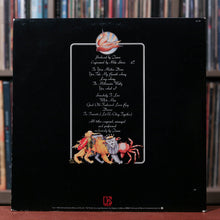 Load image into Gallery viewer, Queen - A Day At The Races - 1976 Elektra, VG+/VG+
