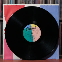 Load image into Gallery viewer, Billy Squier - Emotions In Motion - 1982 Capitol German GEMA

