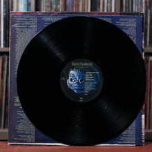 Load image into Gallery viewer, Iron Maiden - Somewhere In Time - 1986 Capitol Records, VG+/VG+

