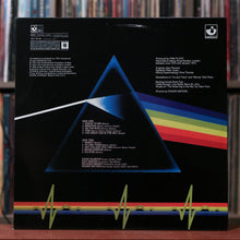 Load image into Gallery viewer, Pink Floyd - The Dark Side Of The Moon - AUSTRALIAN YELLOW VINYL 2020 Harvest, VG+/VG+
