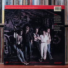 Load image into Gallery viewer, REO Speedwagon - Wheels Are Turnin' - 1984 Epic, VG/VG+
