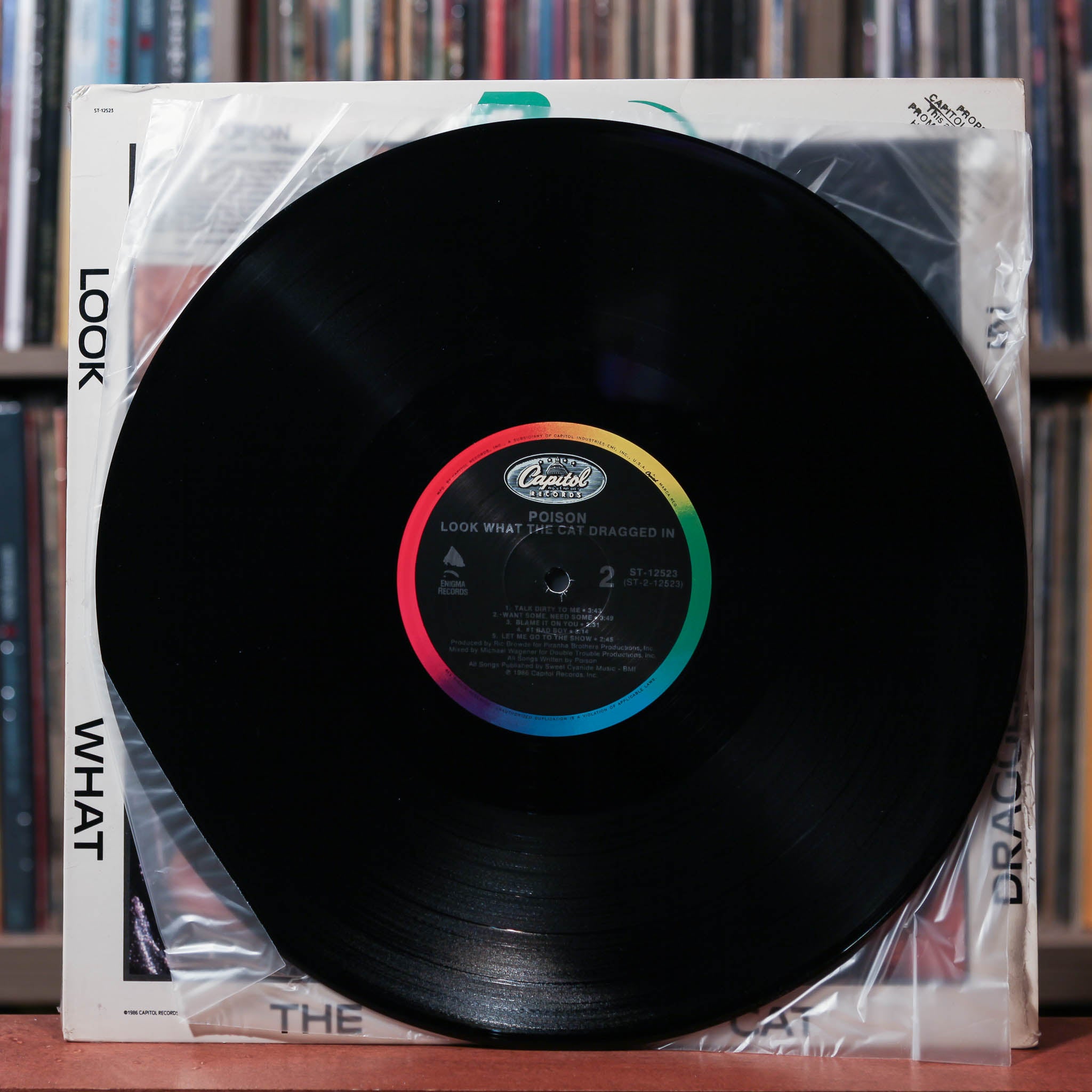 Poison - Look What The Cat Dragged In - PROMO - 1986 Enigma Records, E