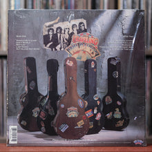 Load image into Gallery viewer, Traveling Wilburys - Volume One - 1988 Warner, VG+/VG+ w/Shrink

