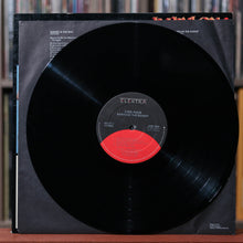 Load image into Gallery viewer, Steel Pulse - Babylon The Bandit - 1985 Elektra, EX/EX
